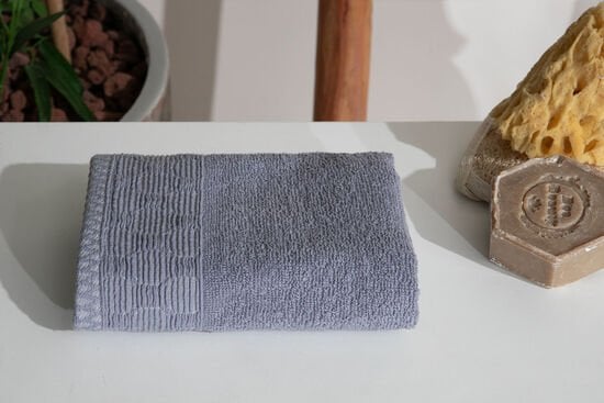 JACQUARD GEOMETRIC PATTERNED BORDERED TOWEL 30X50CM BLUE