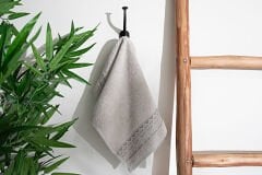 MOTIF PATTERN BORDERED TOWEL 30X50CM STONE